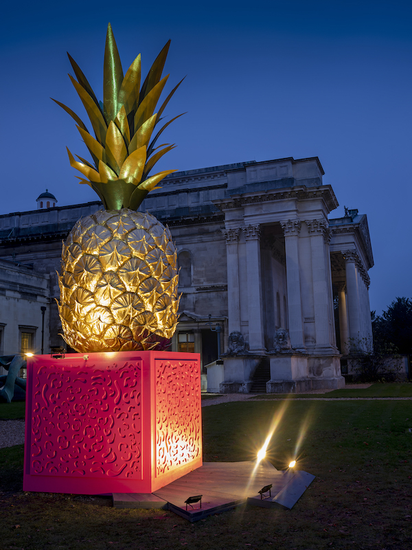 Pineapple lit up outside the museum